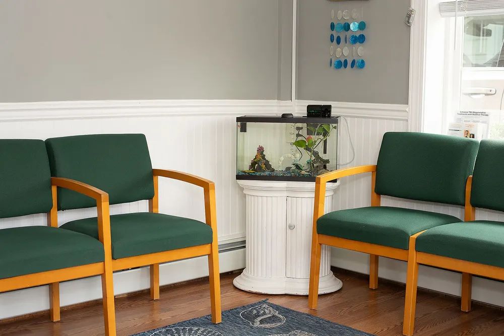 Sea Isle Smiles waiting room with aquarium and comfortable seating